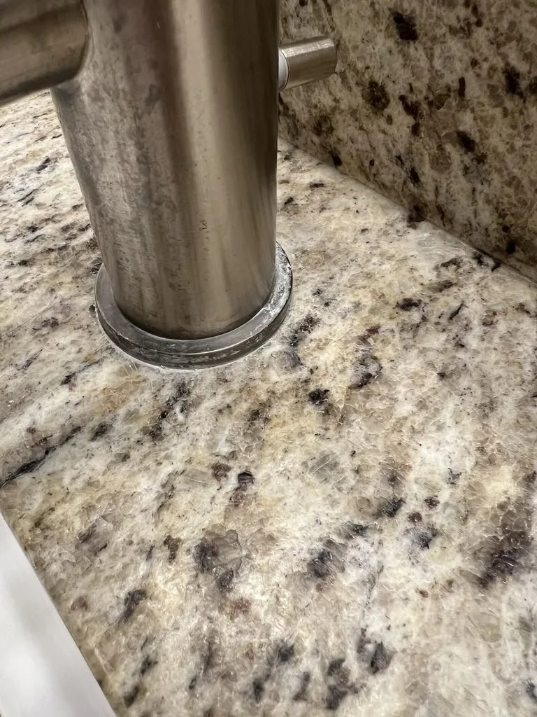 Buildup around a faucet base
